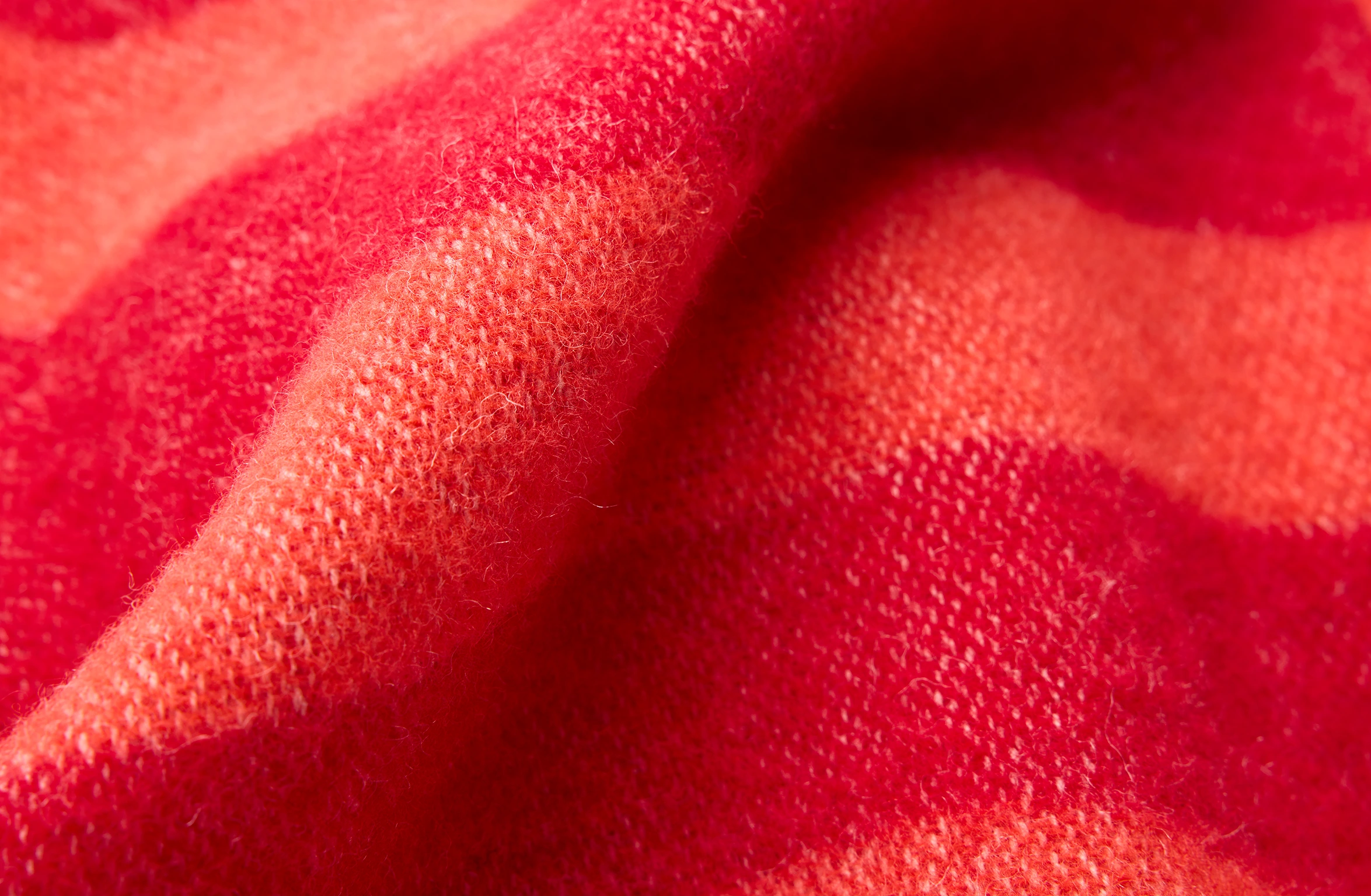 Red scarf with big tone-on-tone Polestar wordmark