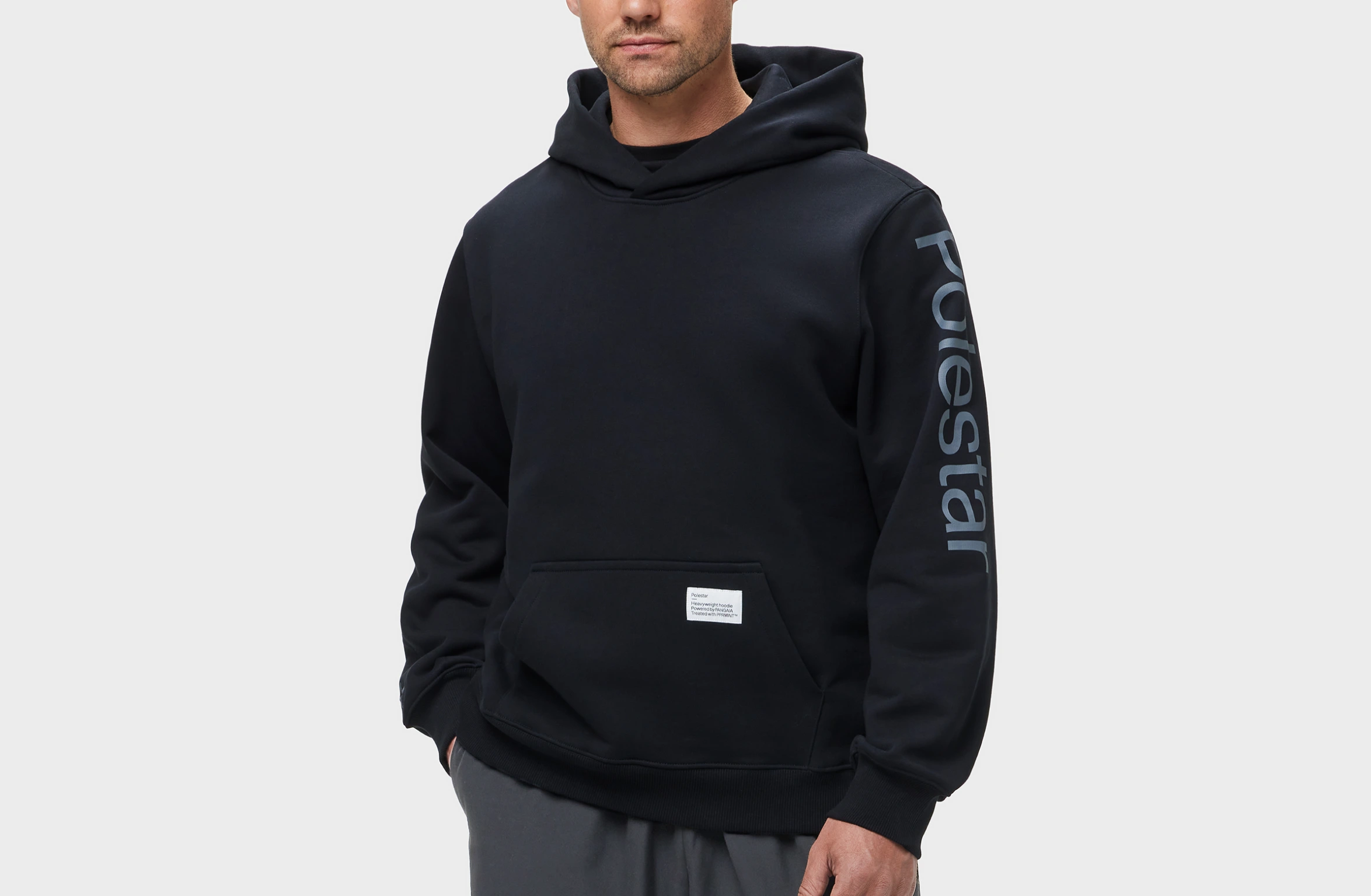 Black hoodie with big Polestar wordmark on left sleeve