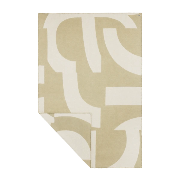 Merino wool blanket in sage green with an abstract pattern