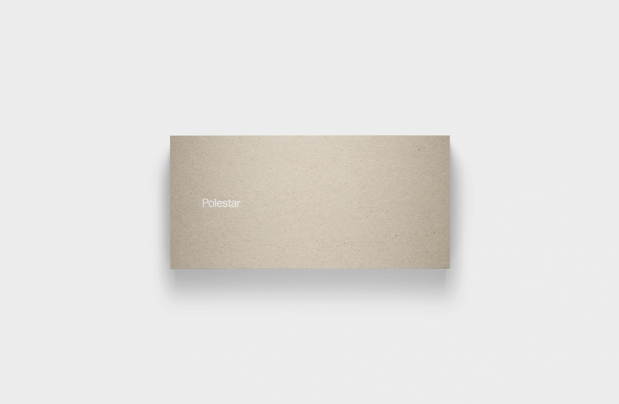 Package with Socks with Polestar Wordmark. One in orange and one in red