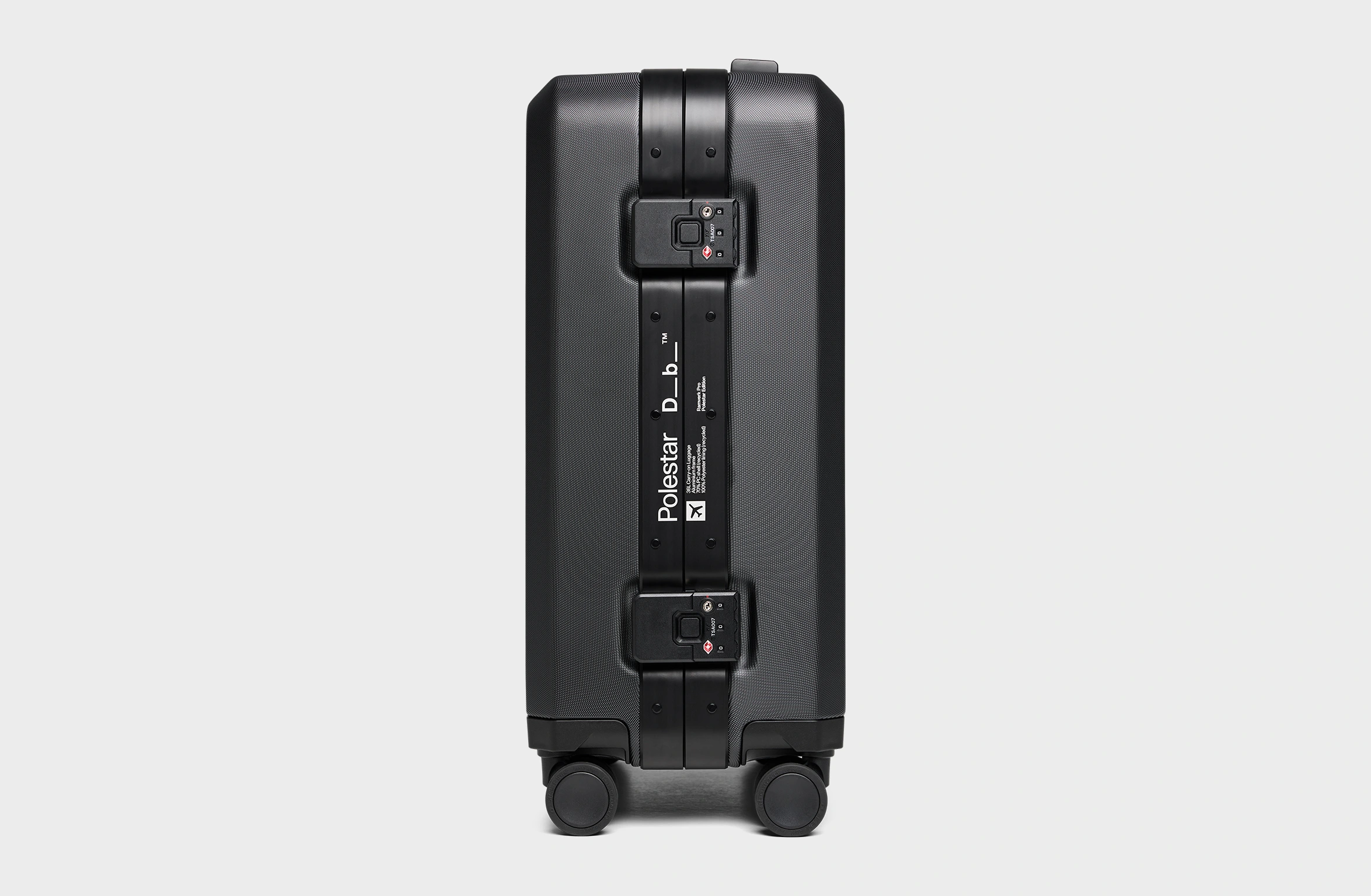Black hard-shell suitcase with reinforced edges, secure locks, and Polestar x Db branding on the side.