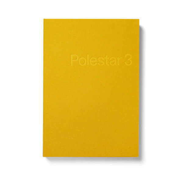 Gul inbunden bok med den präglade texten "Polestar 3" på omslaget.