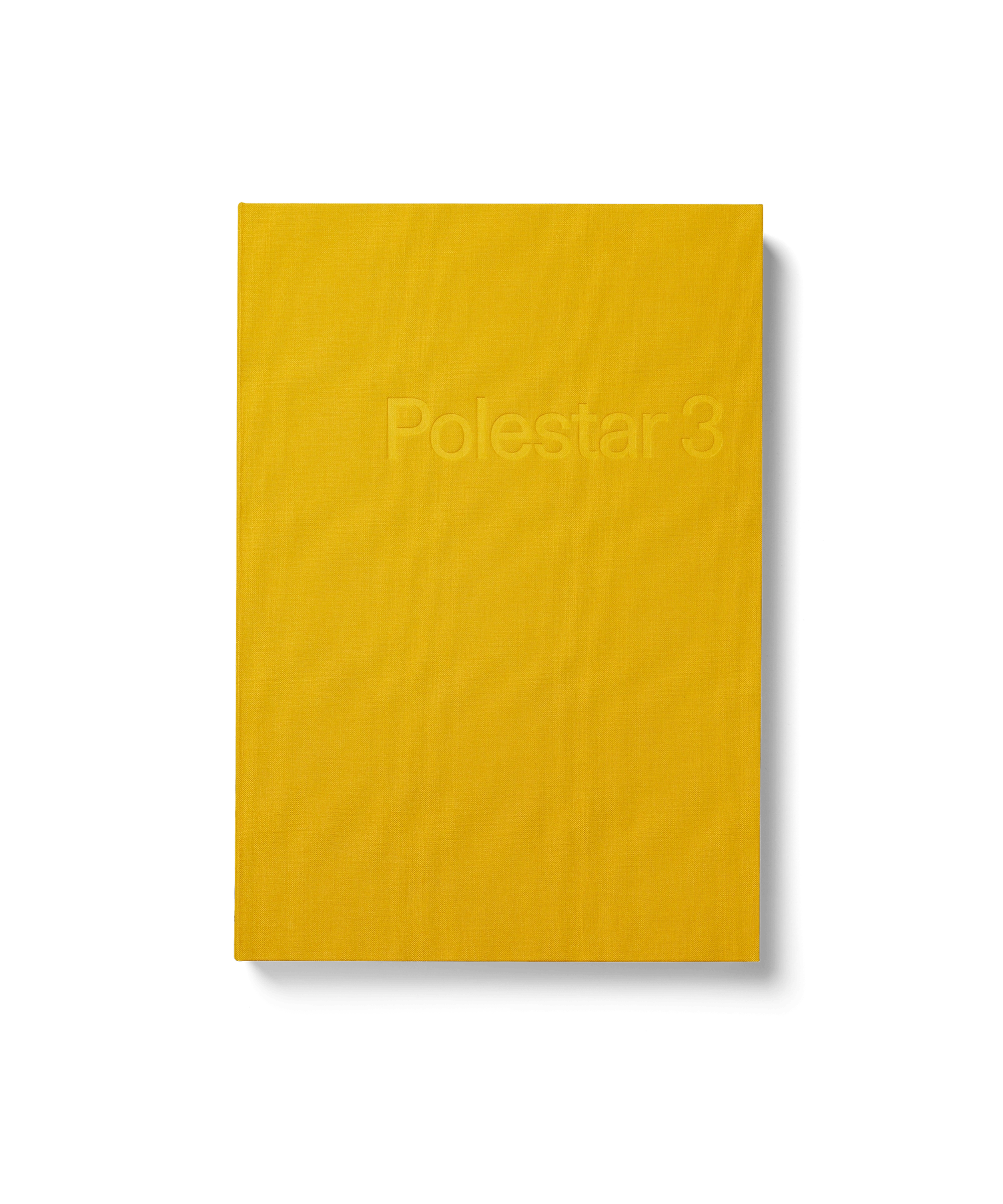Gelbes Buch mit festem Einband und dem geprägten Schriftzug „Polestar 3“ auf dem Cover