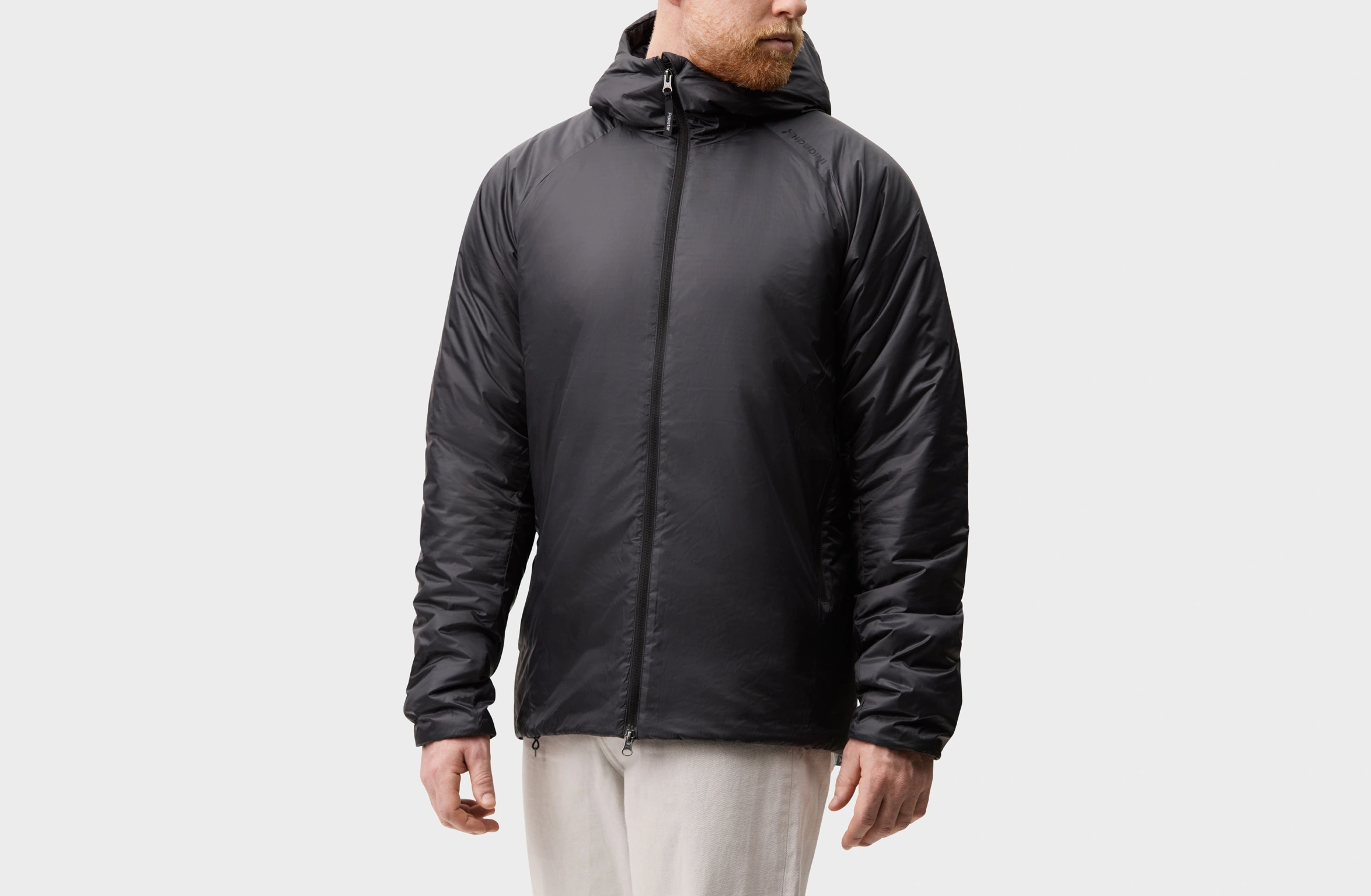 Black lightweight jacket with hood, full zipper, and discreet Polestar wordmark