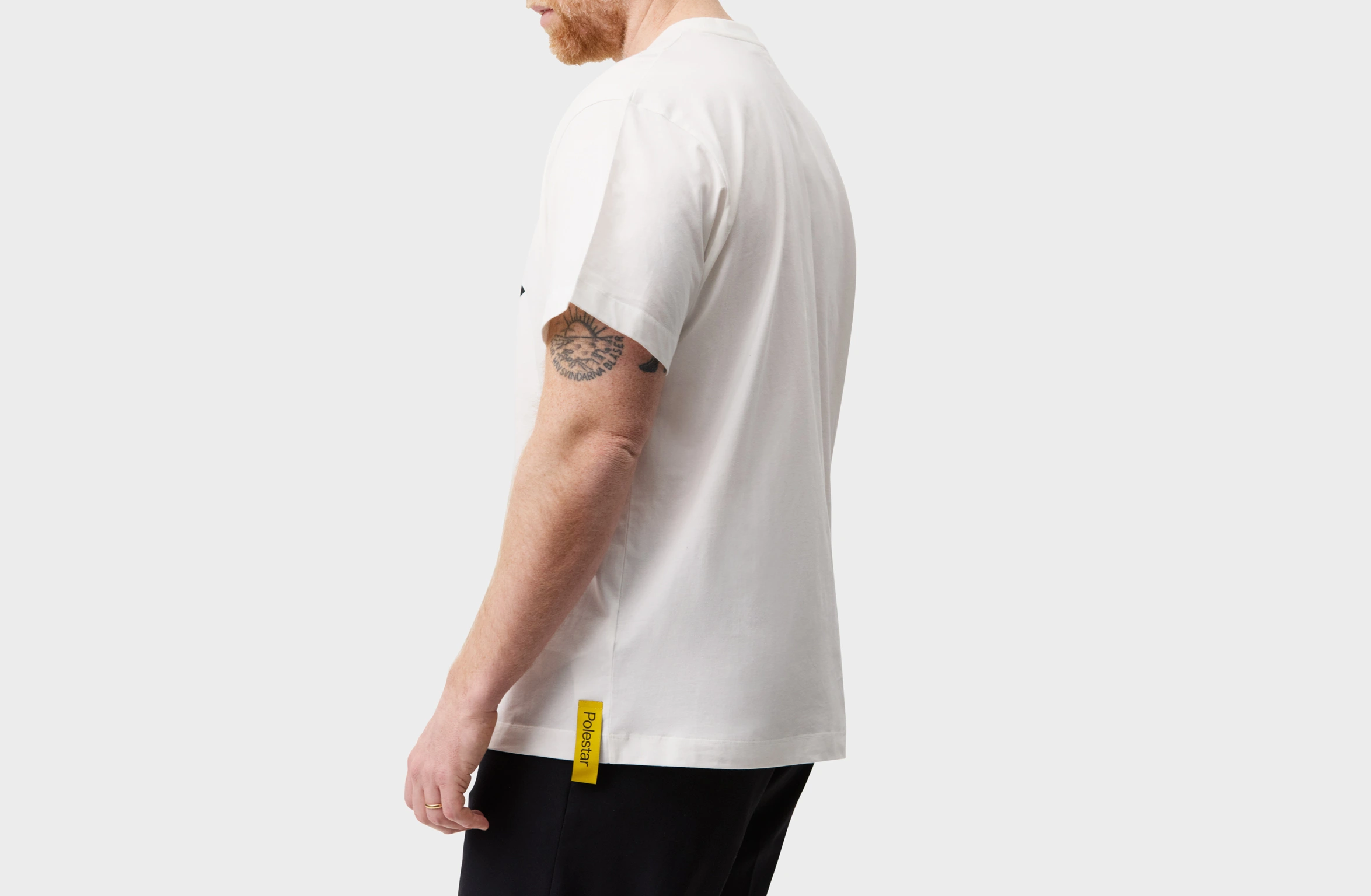 White t-shirt with a large black arrow on the front