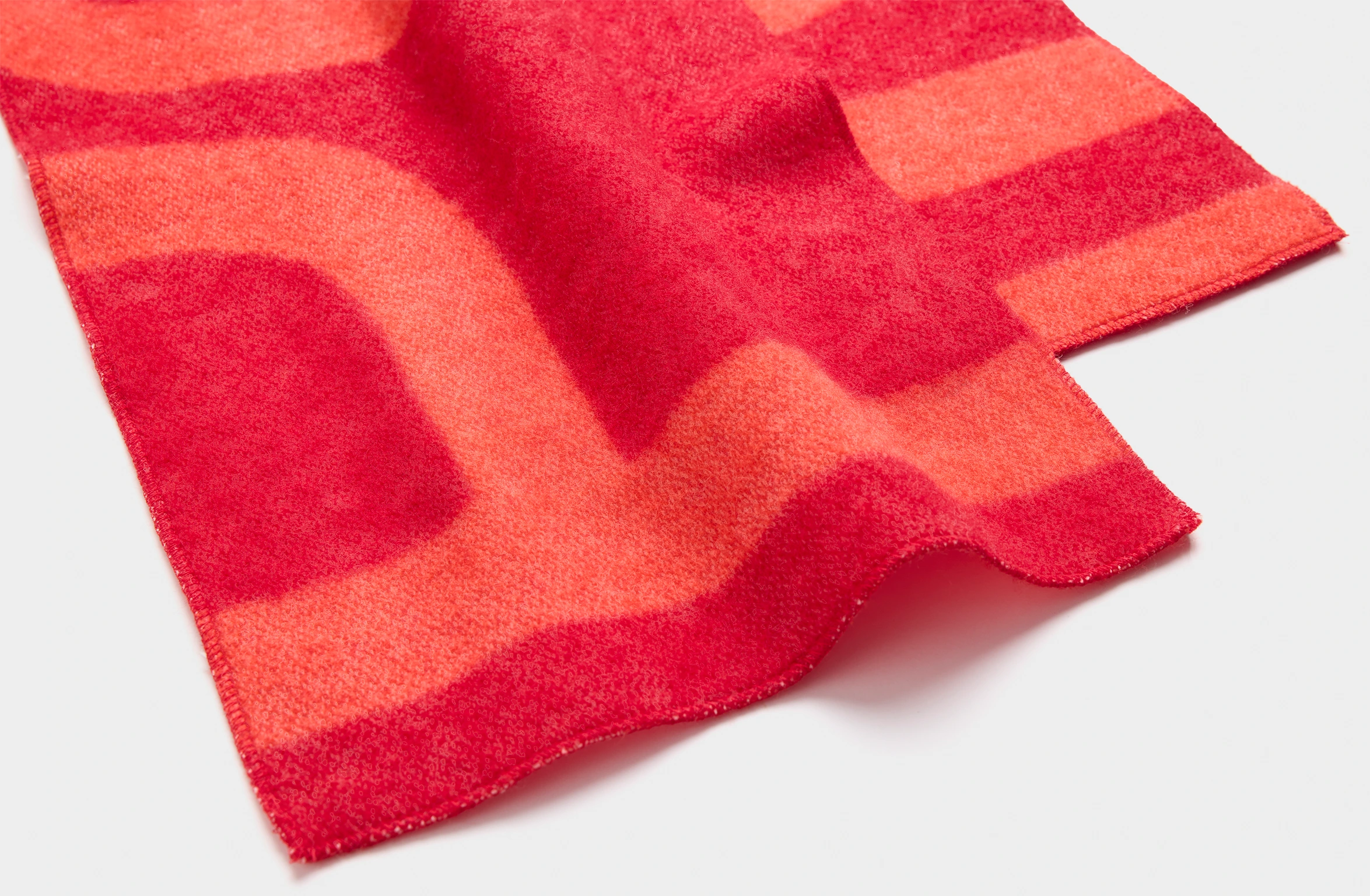 Red scarf with big tone-on-tone Polestar wordmark