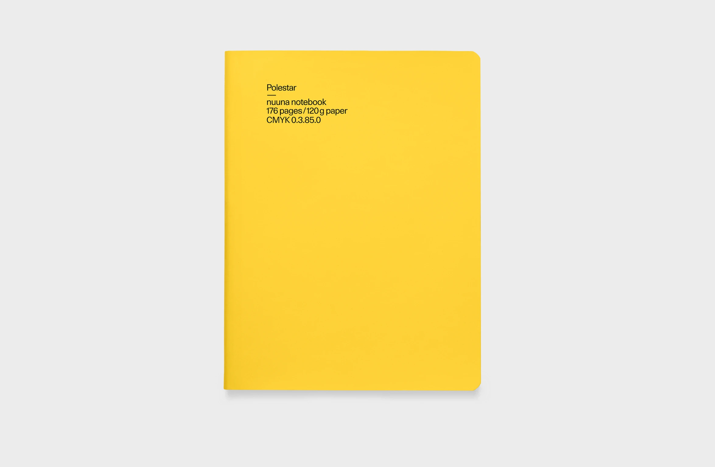 Yellow notbook in leather, elastic strap and integrated pen and phone holder, and a rounded spine.