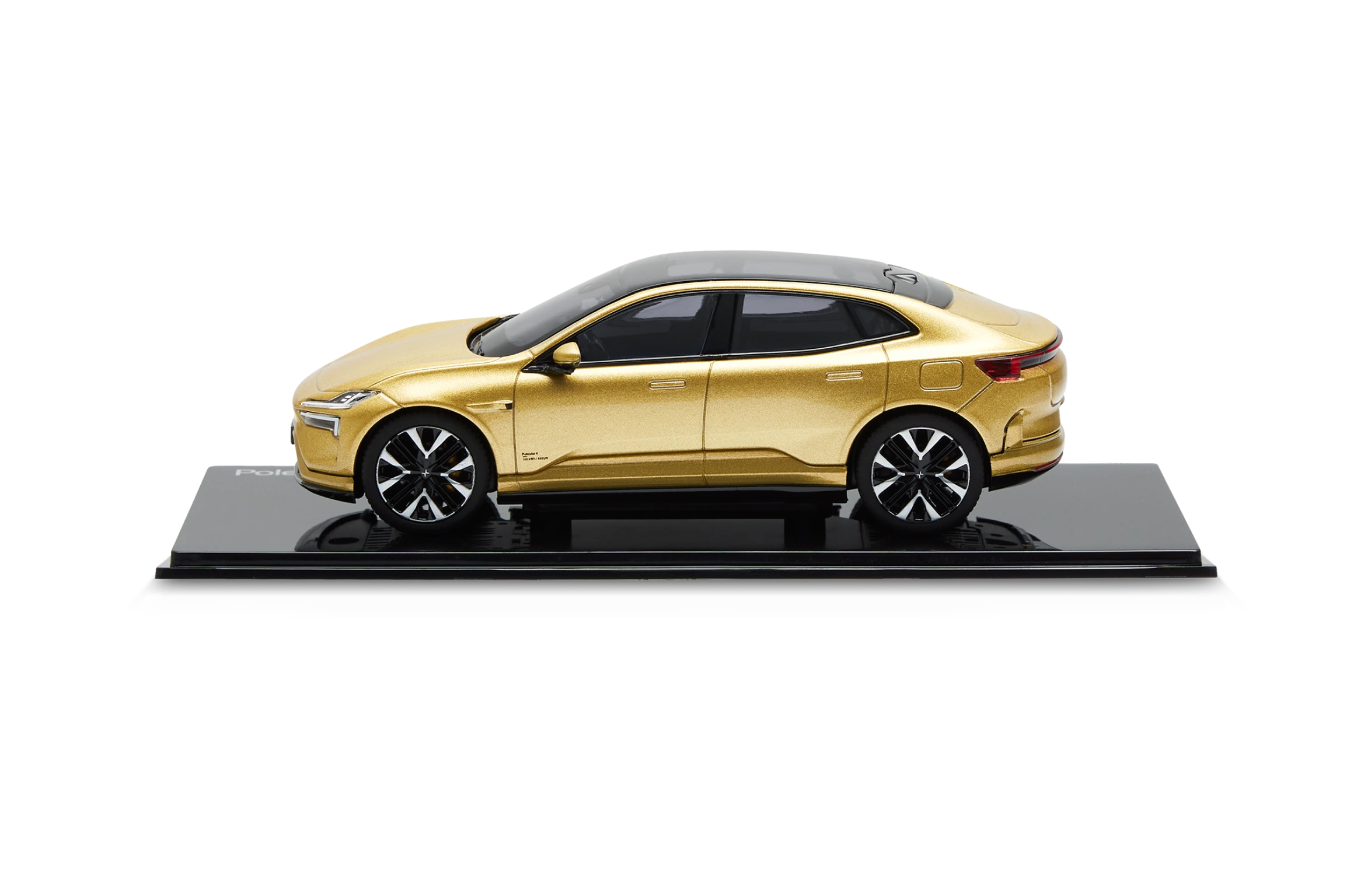 Skalmodell av Polestar 4 i skala 1:43 i färgen gold