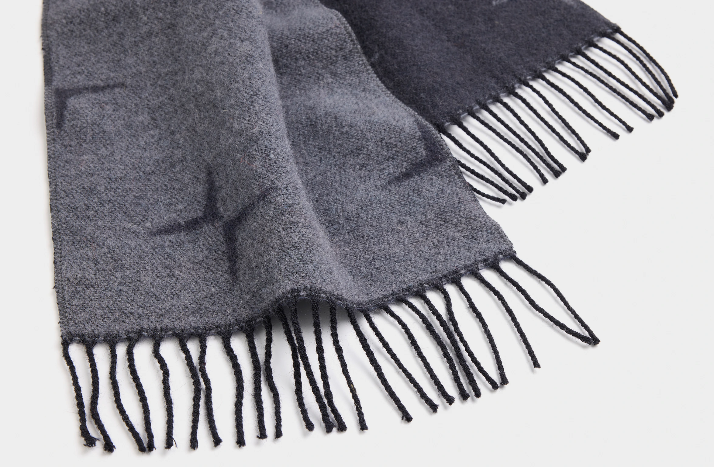 Black scarf with a repeating minimalist cross pattern of the Polestar symbol