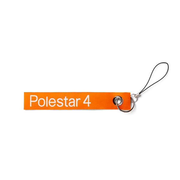 Oranje sleutelhanger met witte tekst "Polestar 4"