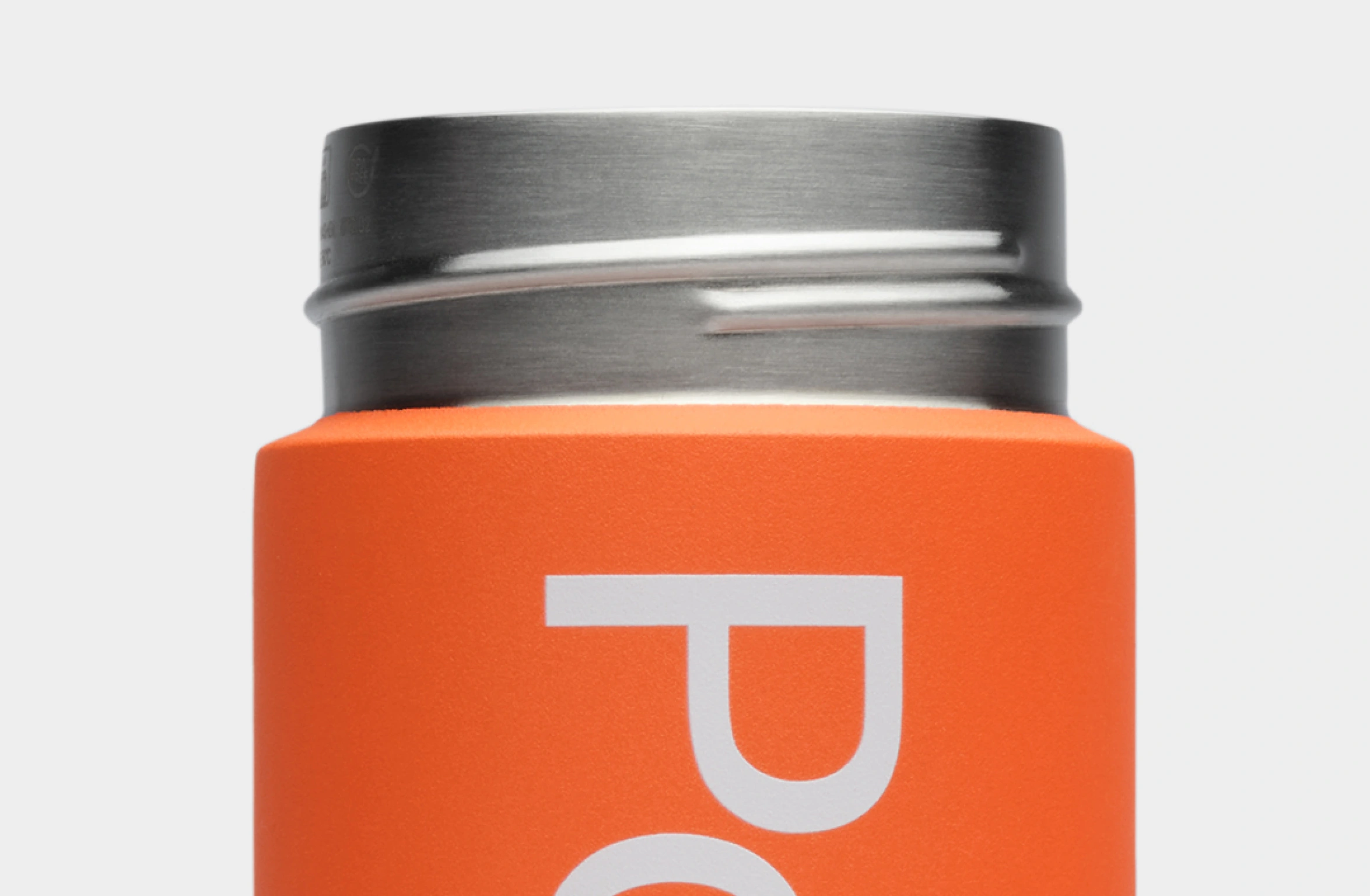Orange water bottle with white Polestar wordmark